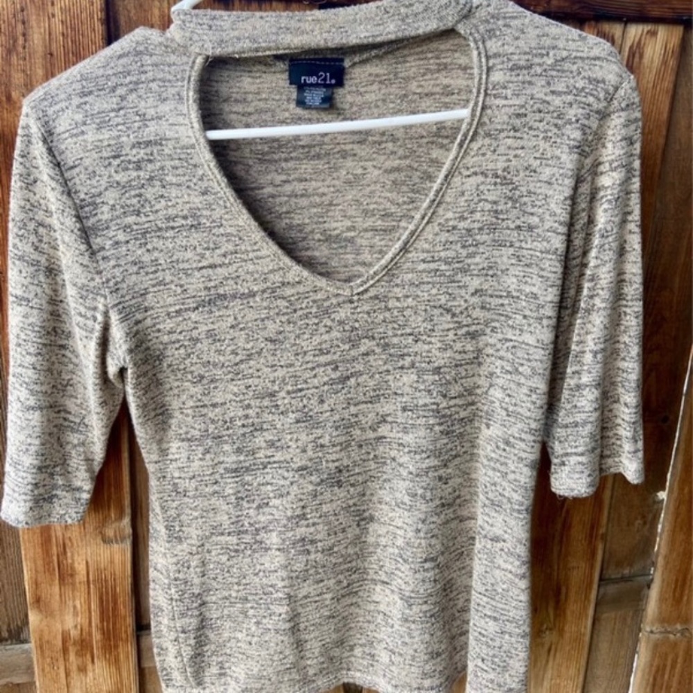 tan v-neck shirt, nice for business casual attire.